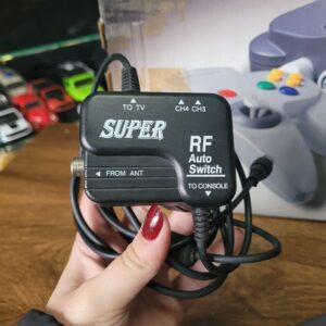 Antigo Nintendo 64 na Caixa Funcionando